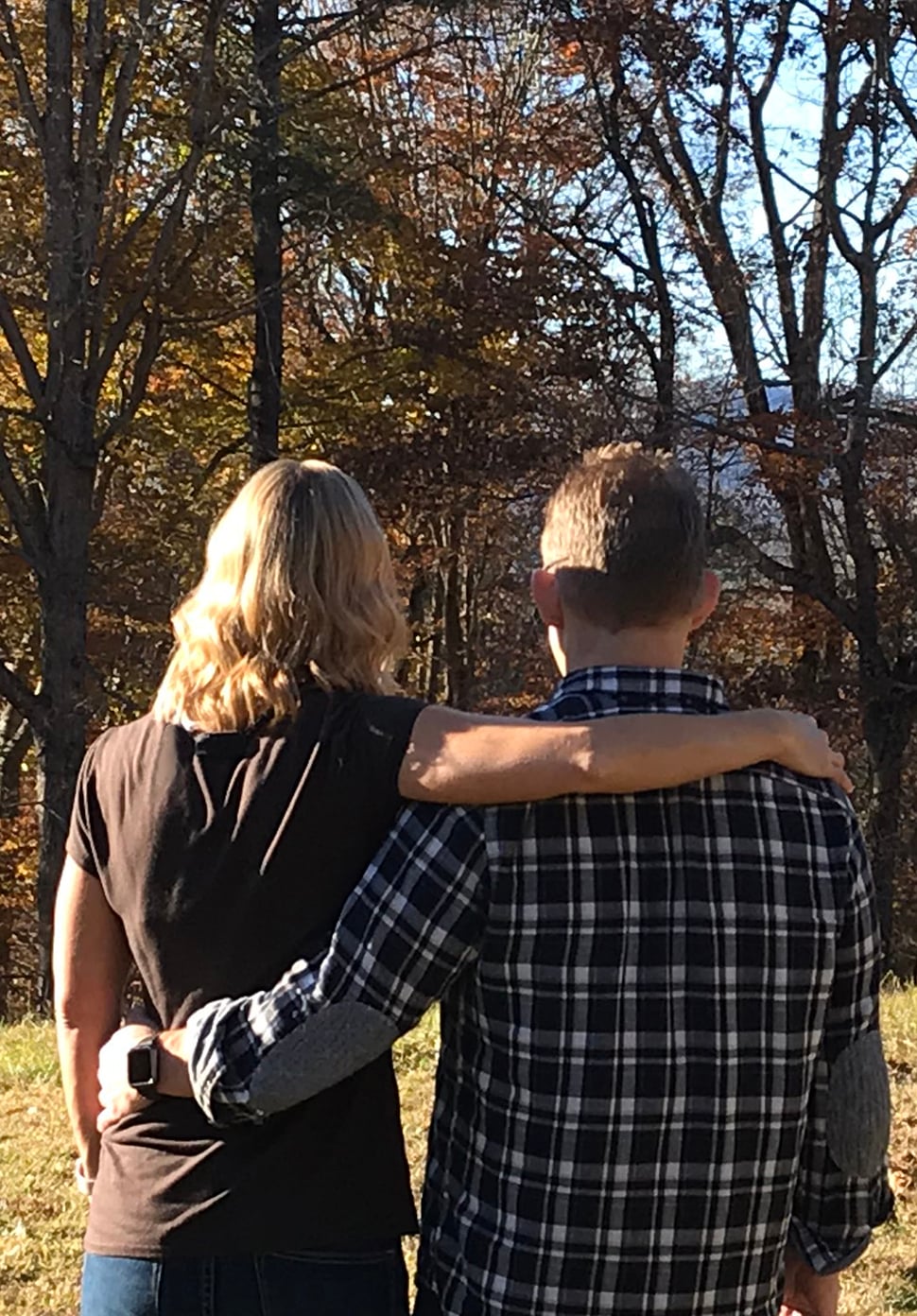 couple with their arms around each other